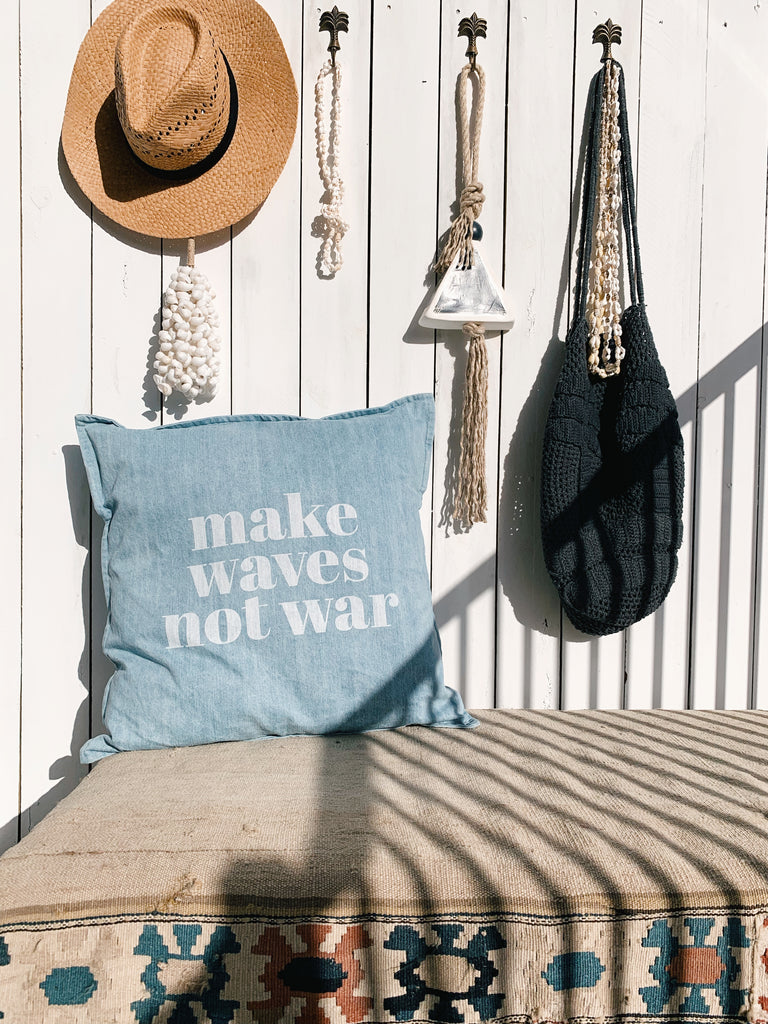 makes waves not war cushion | denim