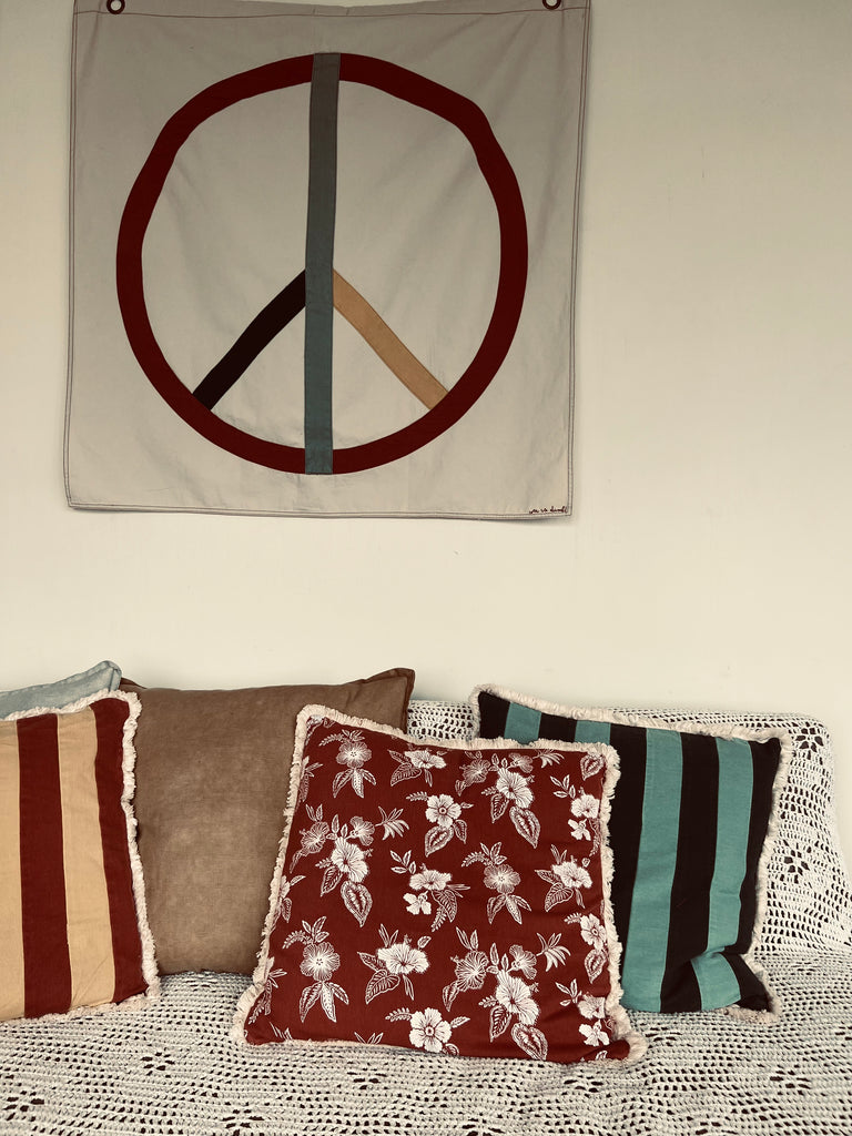 med stripe cushion | rust + teal