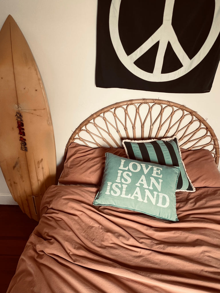 love is an island cushion | aqua